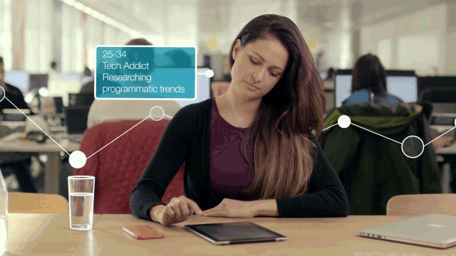 Graphic & Live Action Film - scan across office with staff in gif